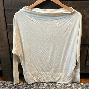 Stella & dot cream colored top. NWT size s. Boat neck or can wear off shoulders